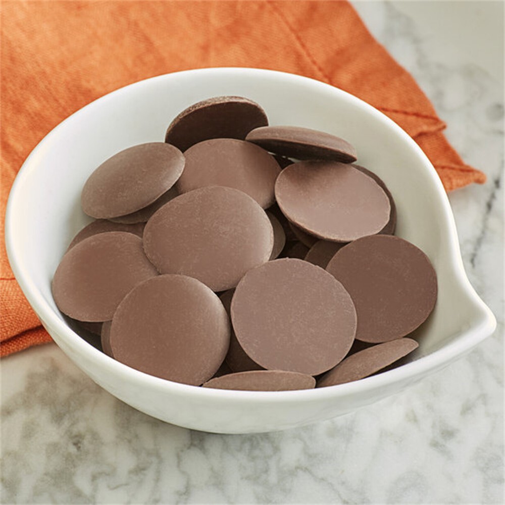 Guittard 25 lb. Soleil d’Or 38% Milk Chocolate Wafers WS-409G3380C25